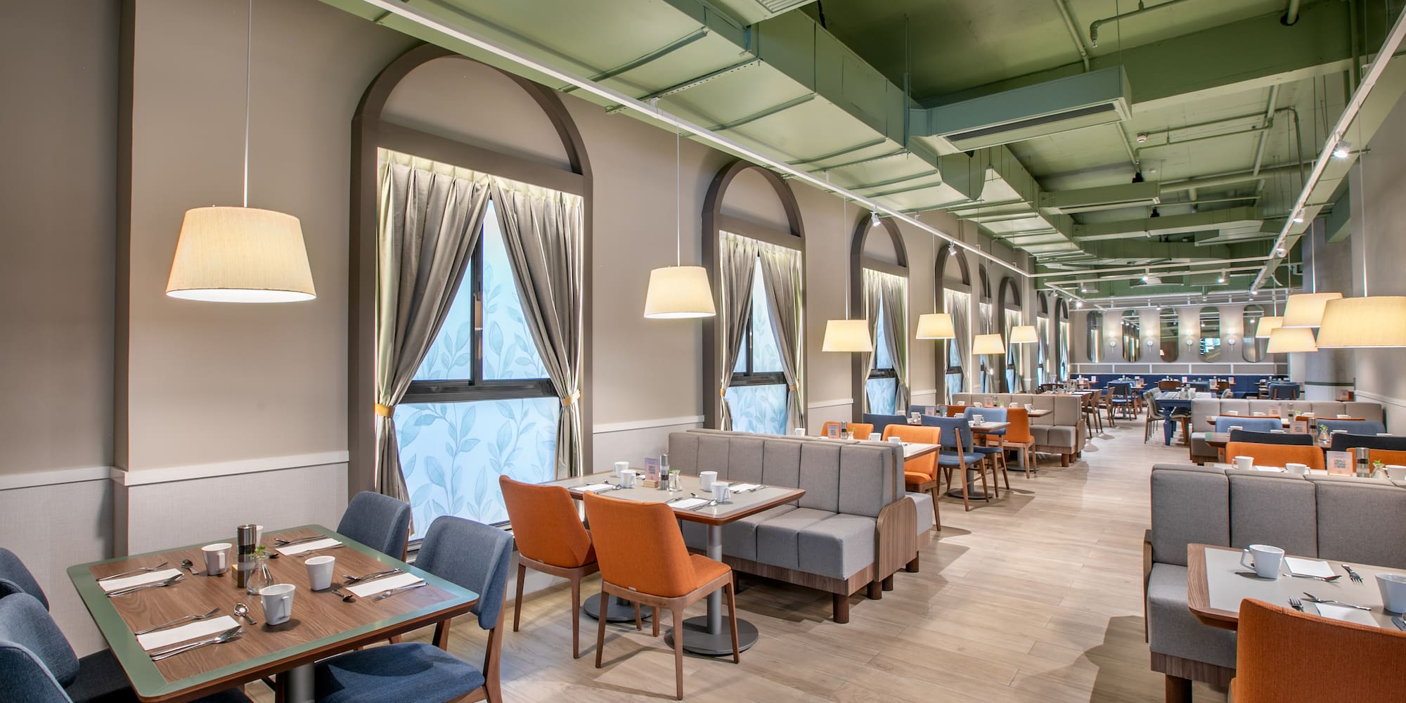 a room with tables and chairs