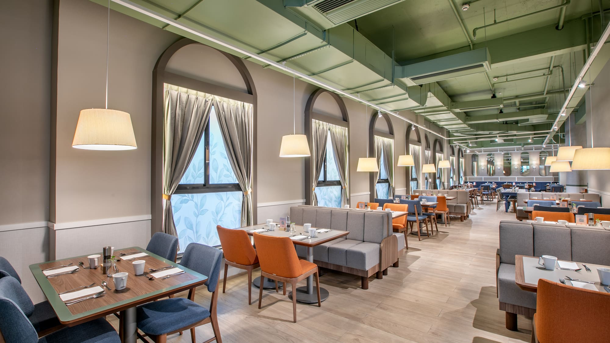 a room with tables and chairs