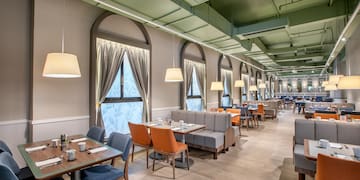 a room with tables and chairs