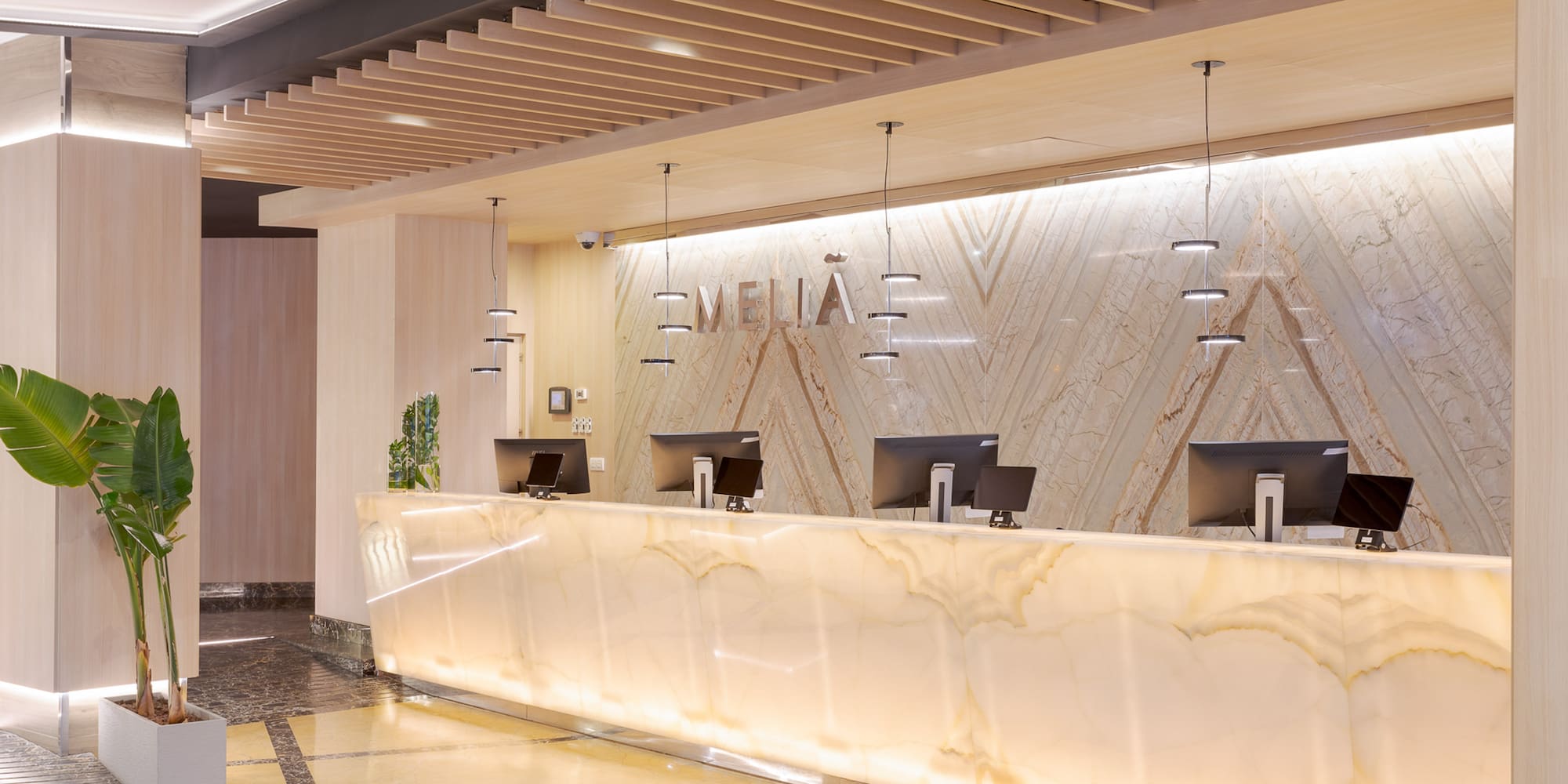 a reception desk in a hotel