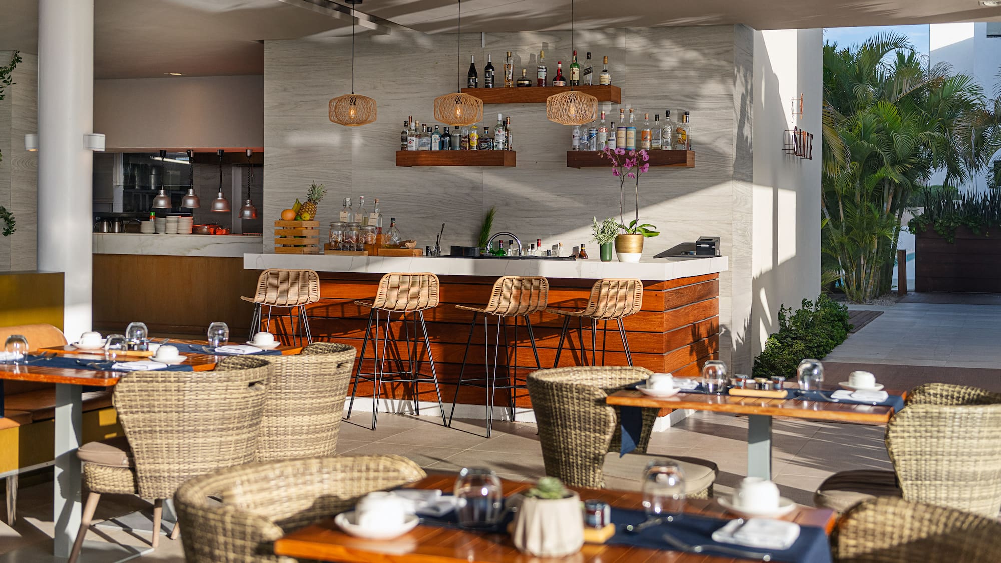 a restaurant with tables and chairs