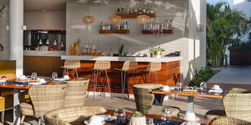 a restaurant with tables and chairs