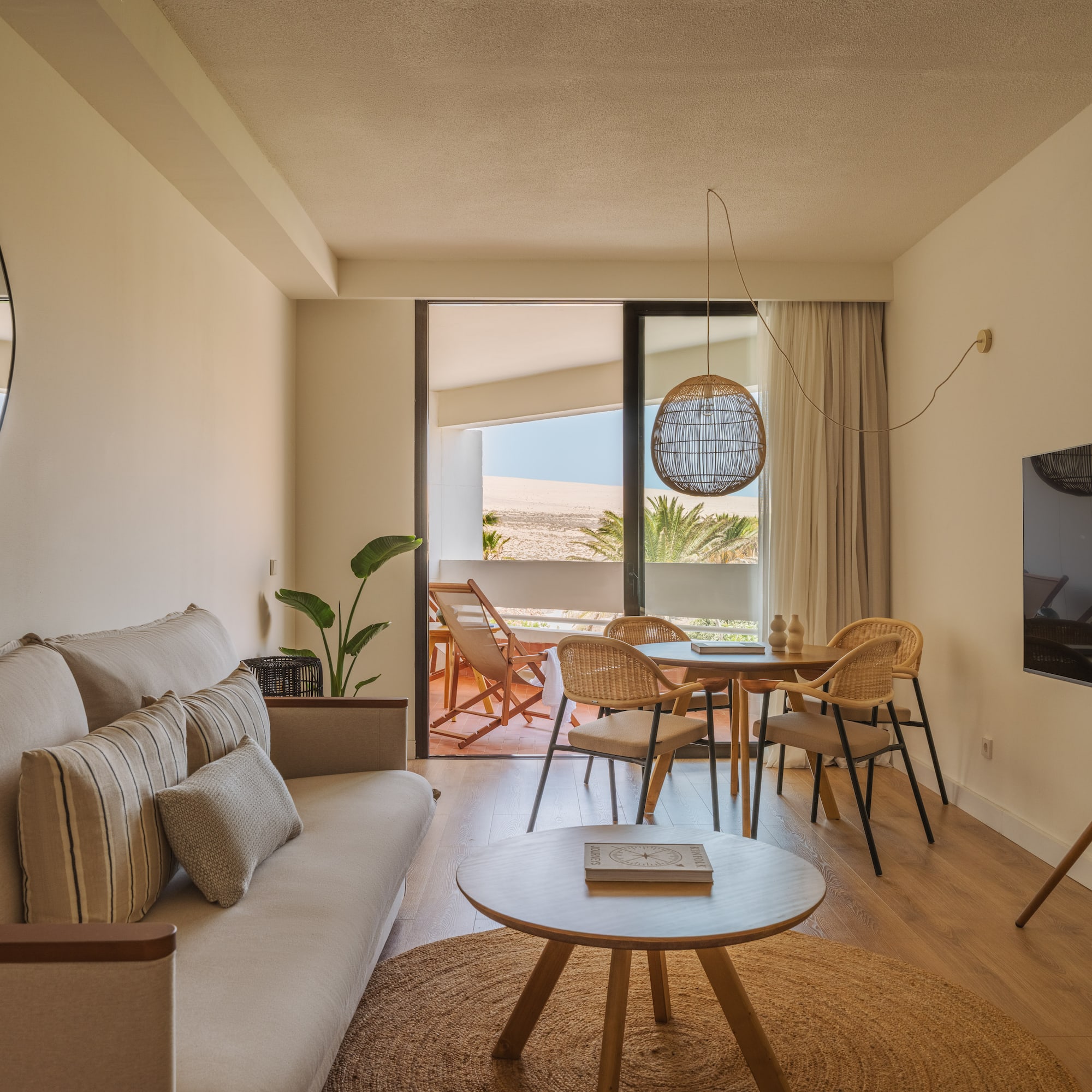 a living room with a couch and table