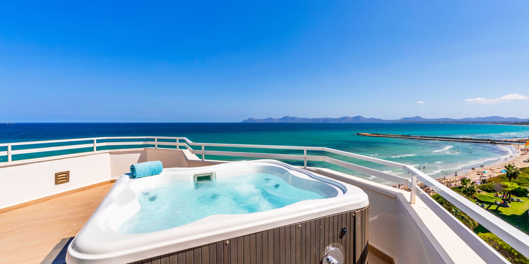 a hot tub overlooking the ocean