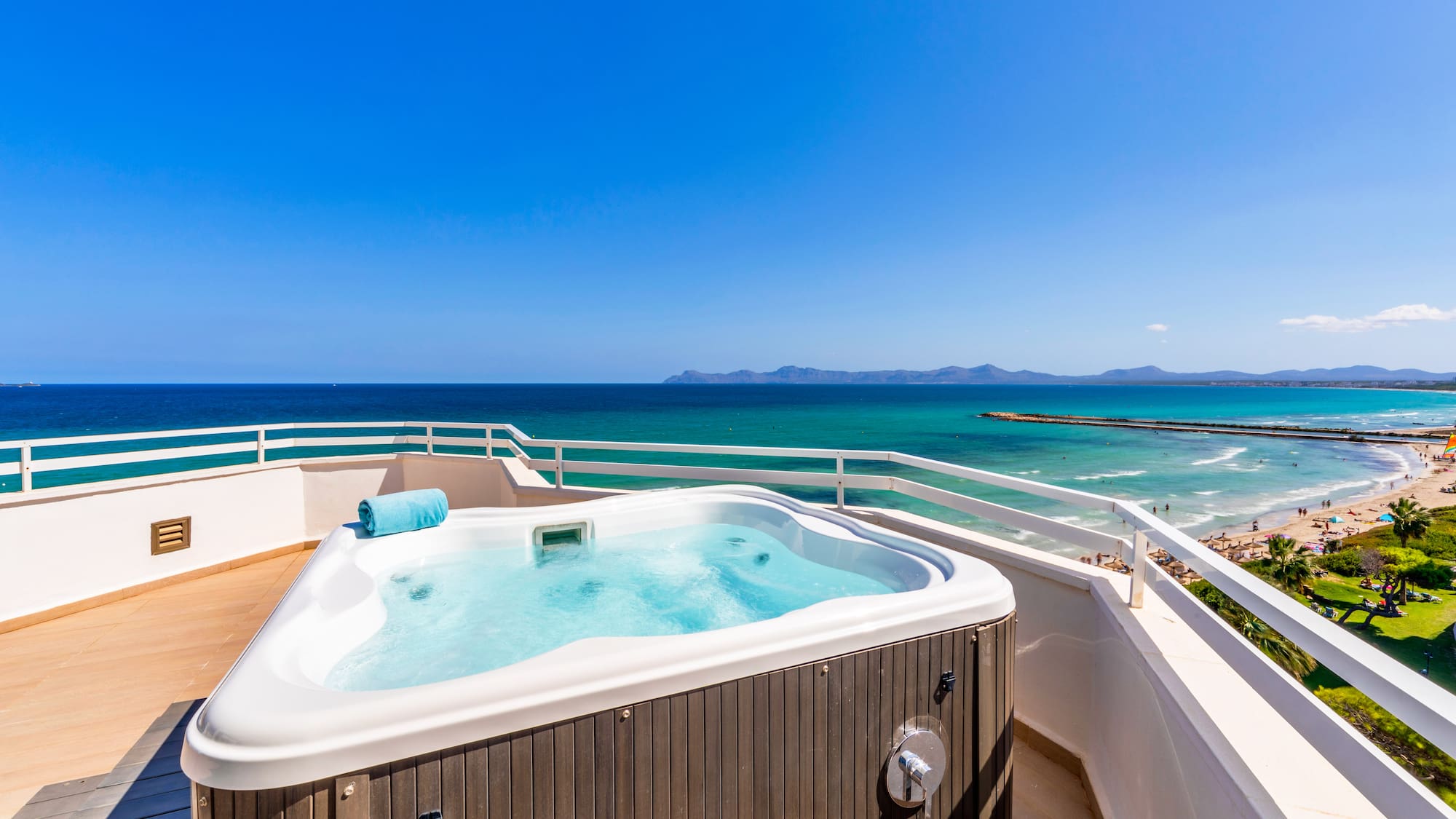 a hot tub overlooking the ocean