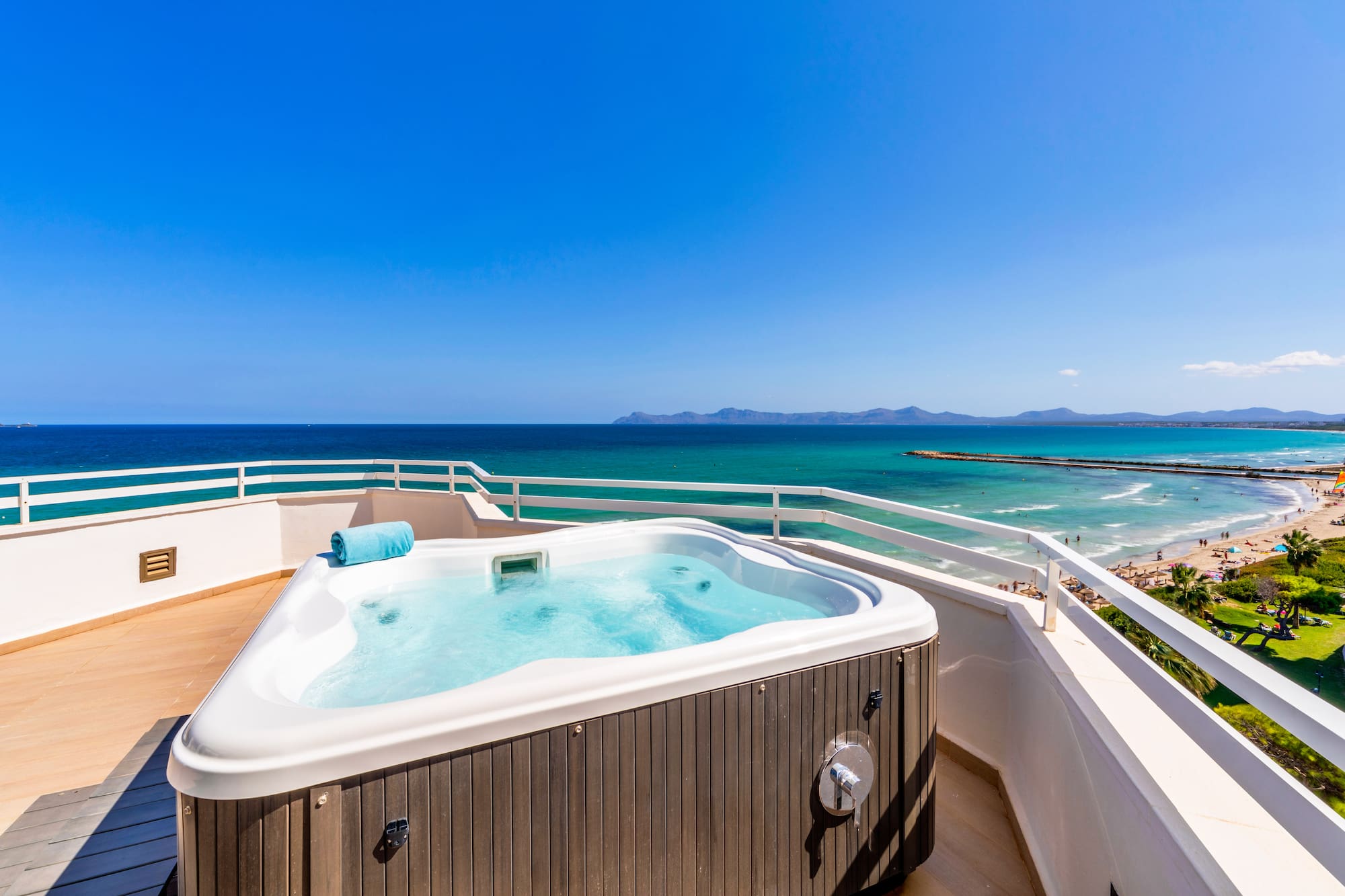 a hot tub overlooking the ocean
