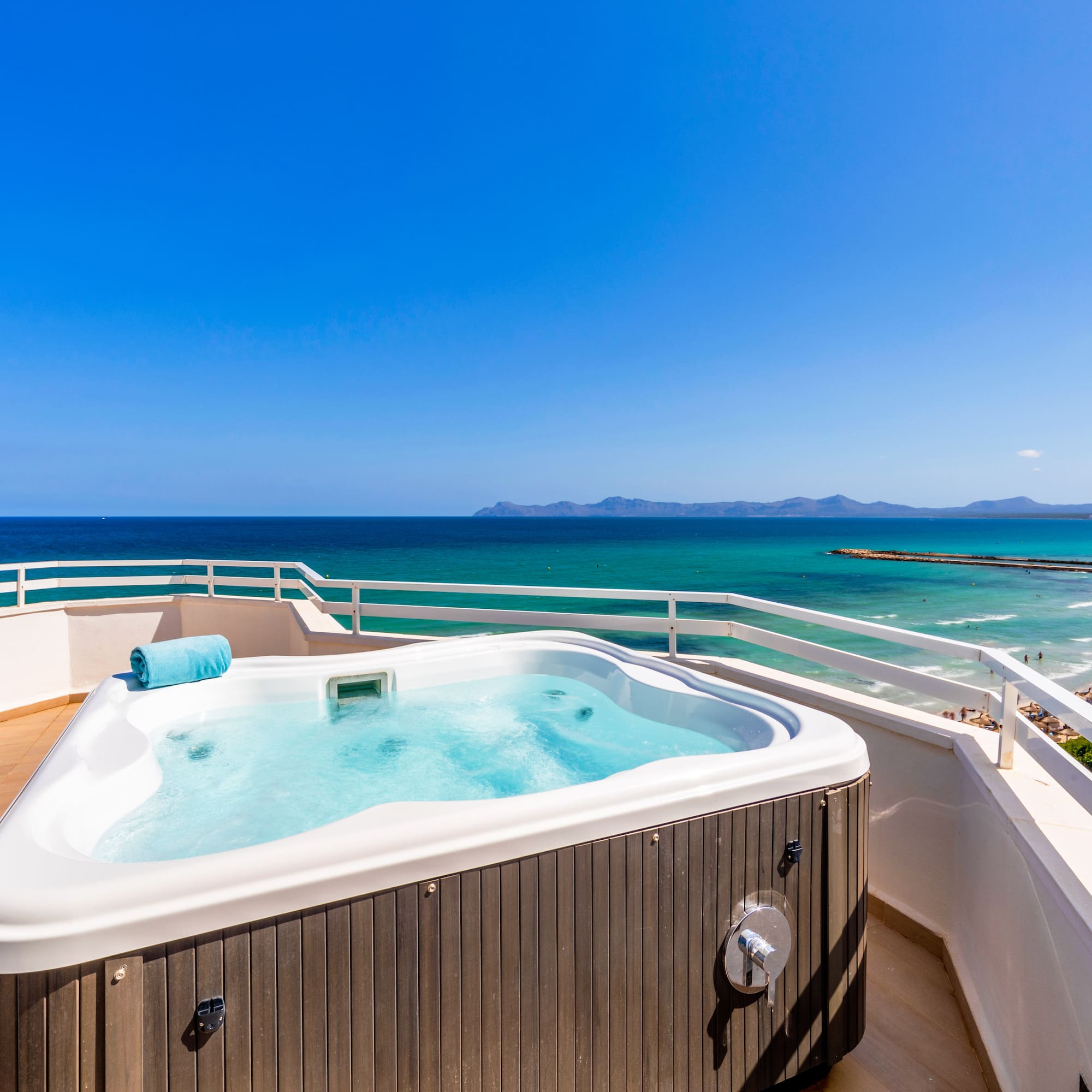 a hot tub overlooking the ocean