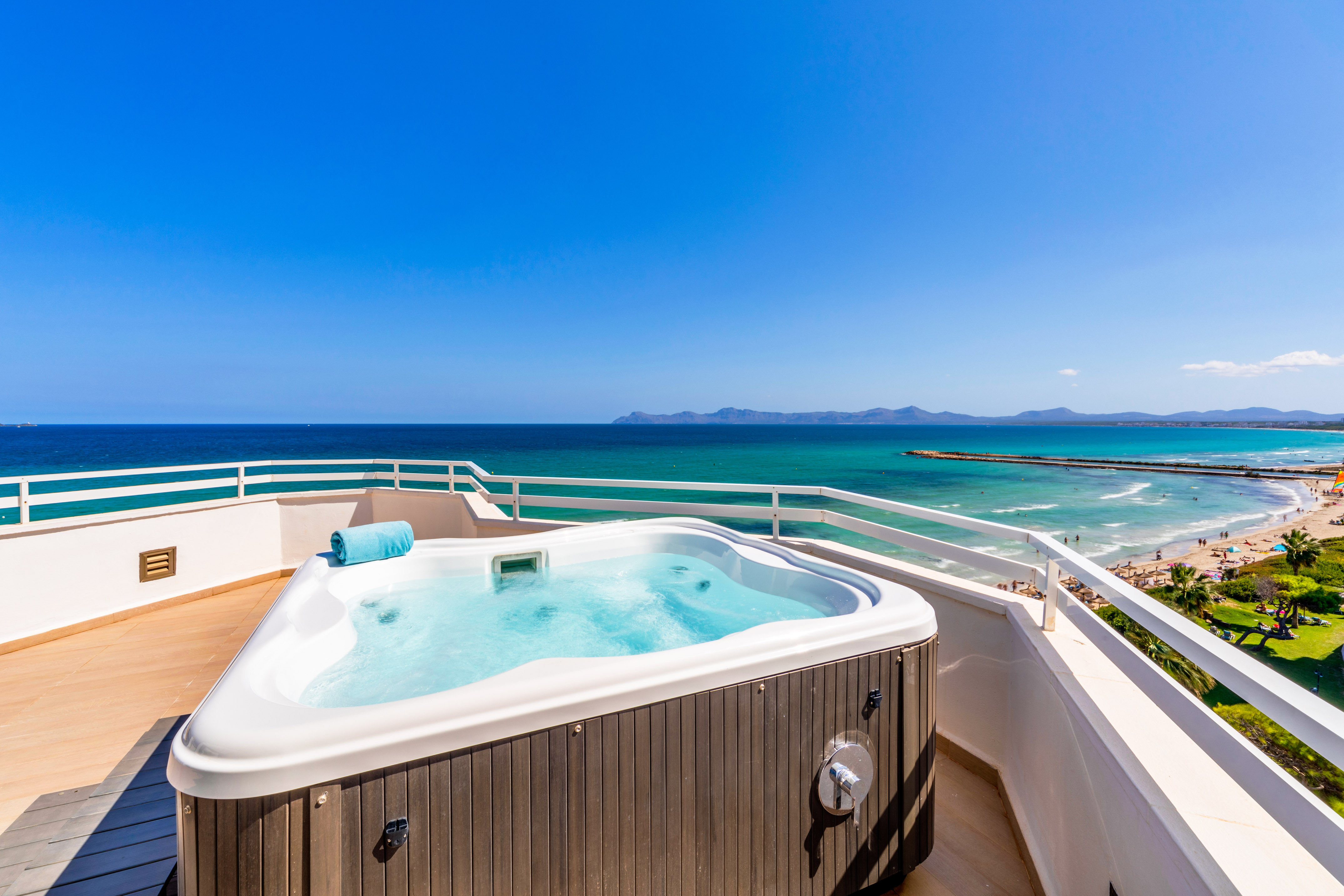 a hot tub overlooking the ocean