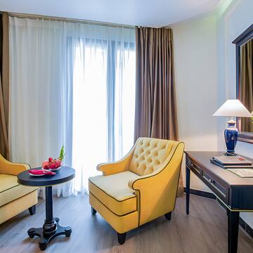 a room with a table and chairs