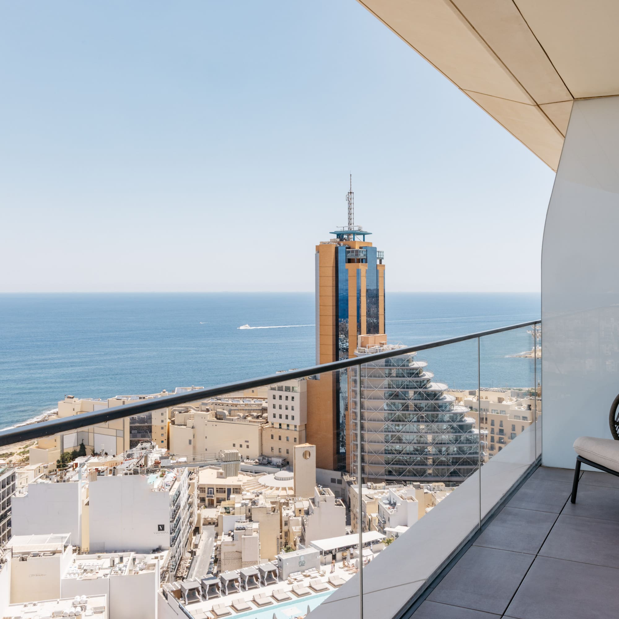a balcony overlooking a city