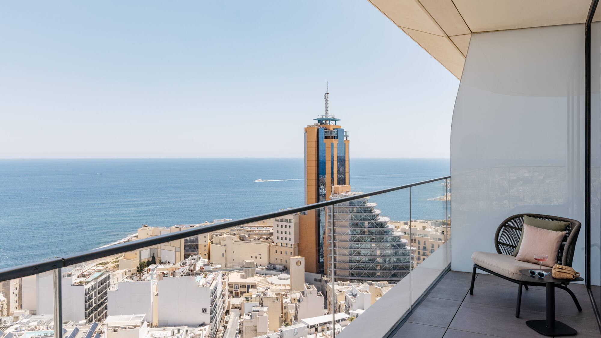 a balcony overlooking a city