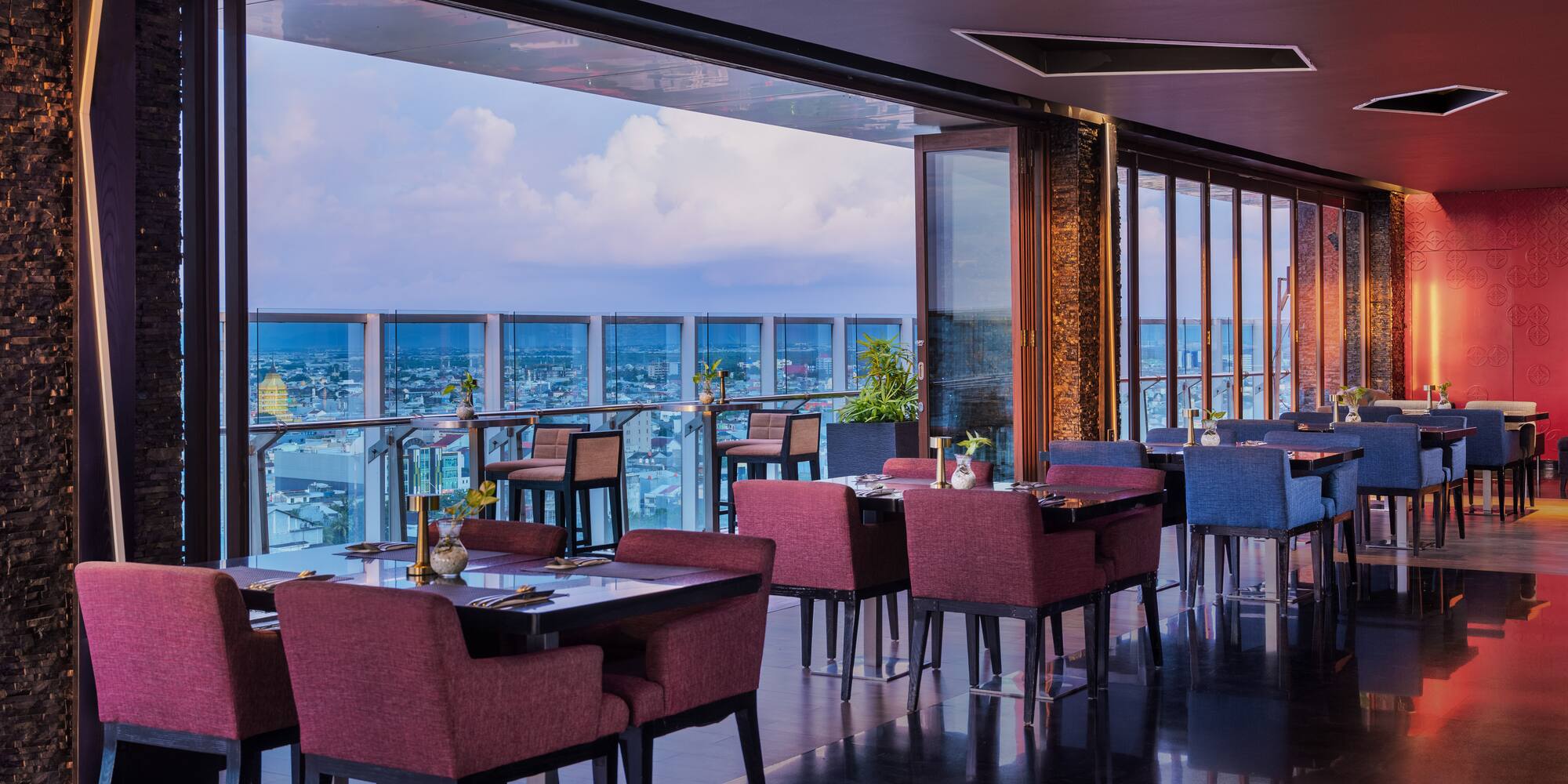 a restaurant with tables and chairs