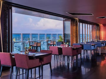 a restaurant with tables and chairs