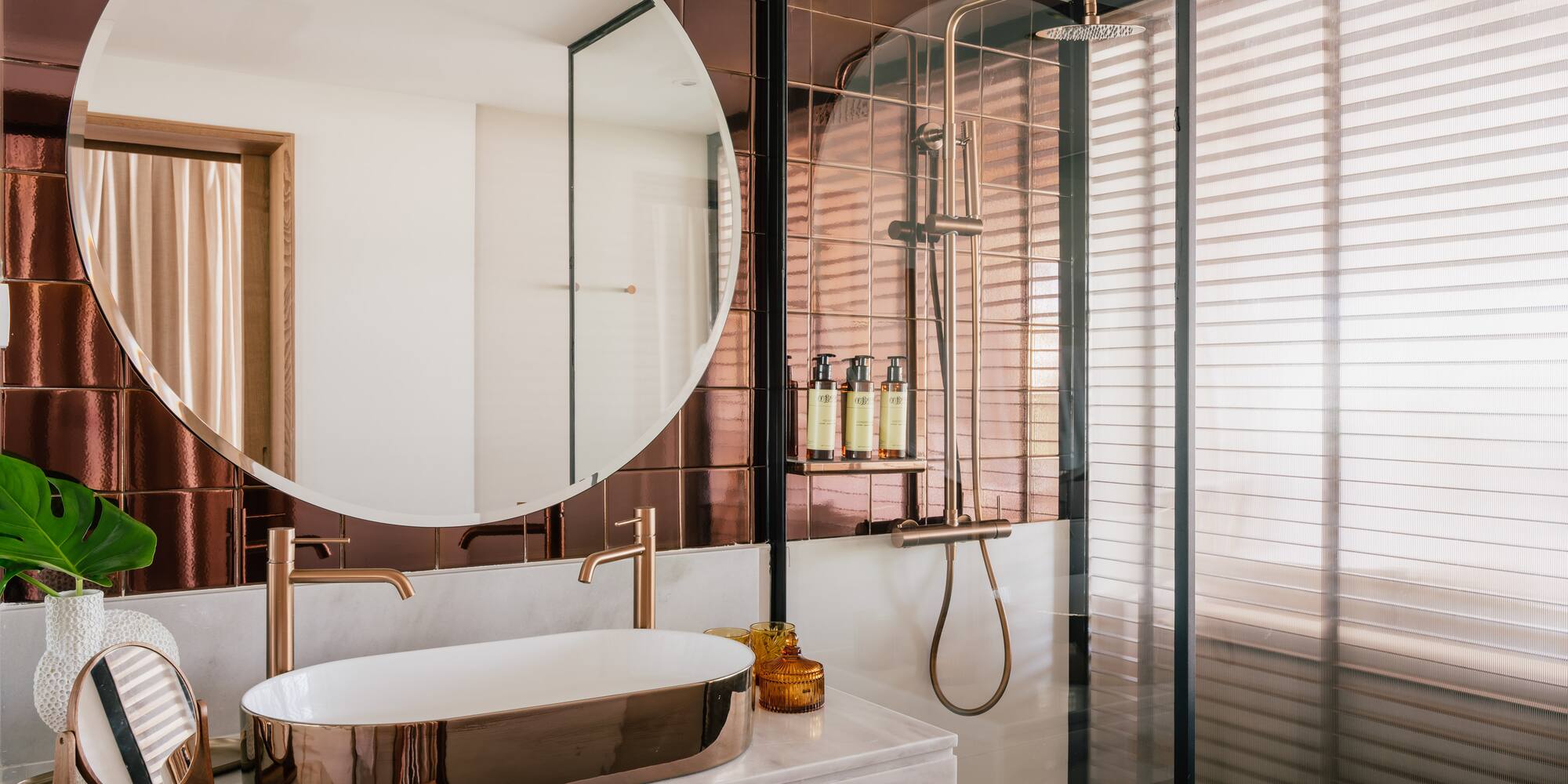 a bathroom with a sink and shower