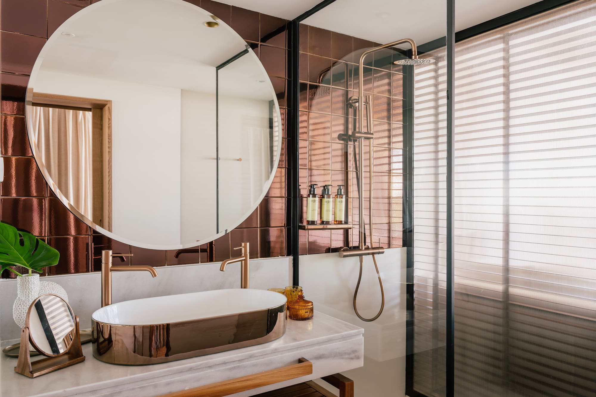 a bathroom with a sink and shower