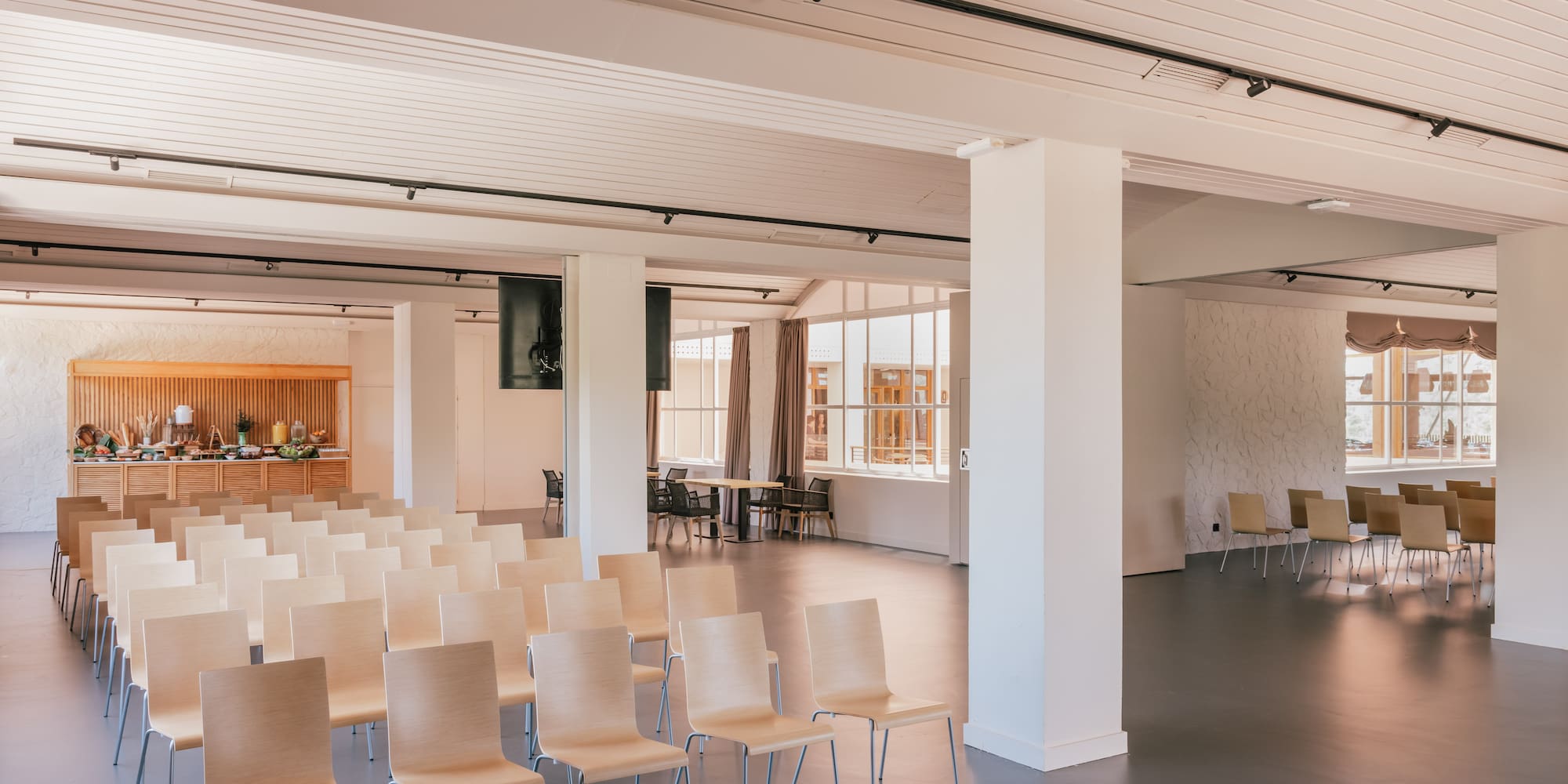 a room with rows of chairs
