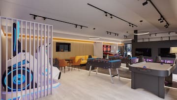 a room with a table and chairs