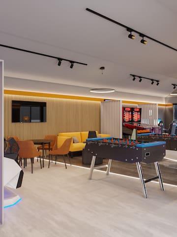 a room with a table and chairs