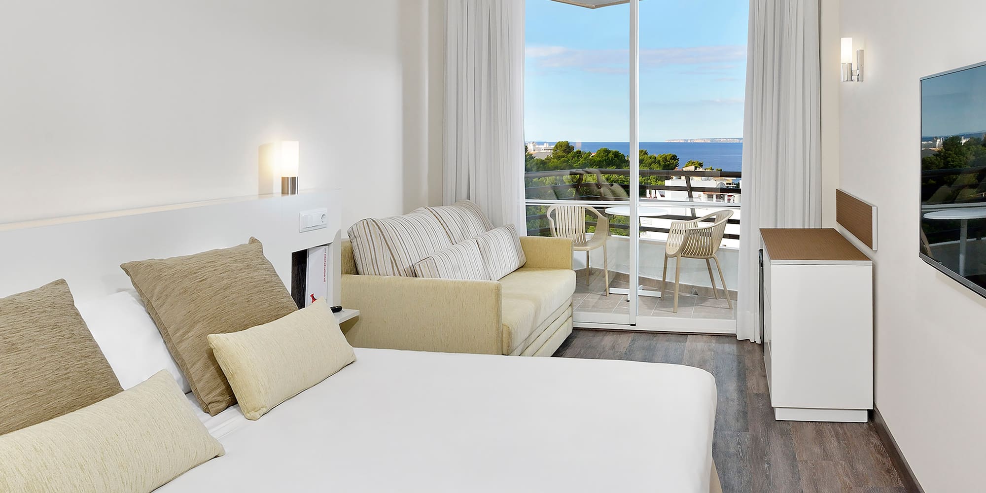 a room with a bed and a fireplace