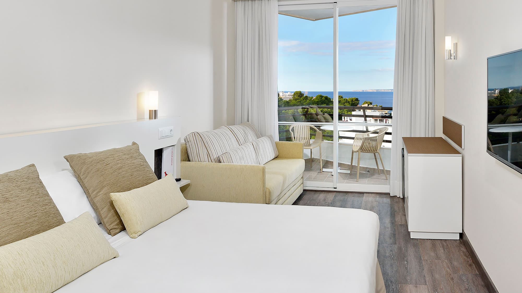 a room with a bed and a fireplace