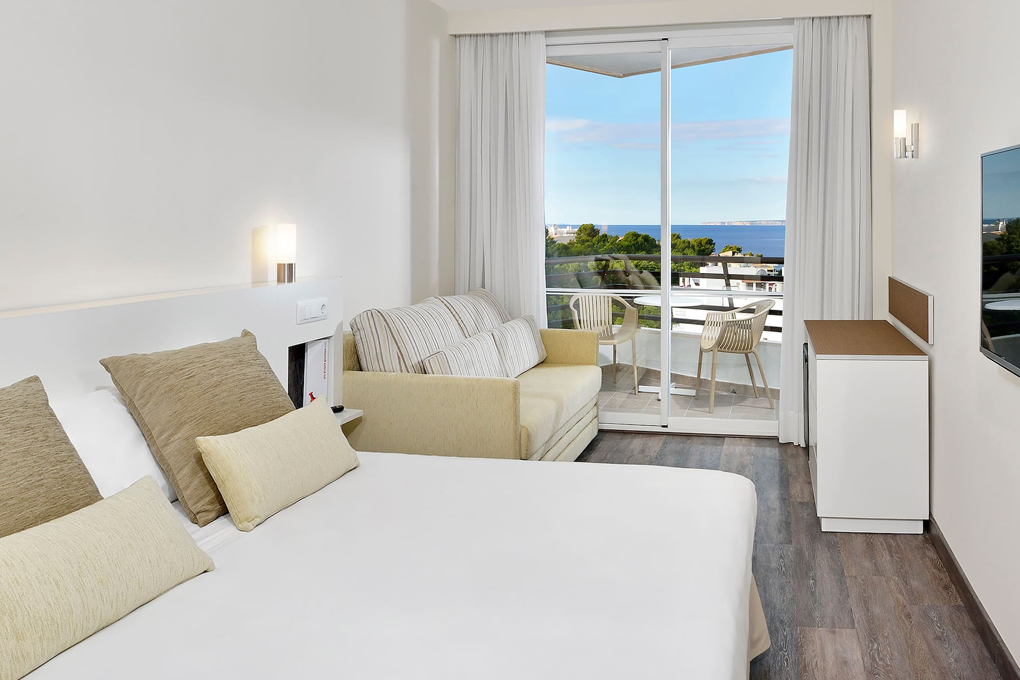 a room with a bed and a fireplace