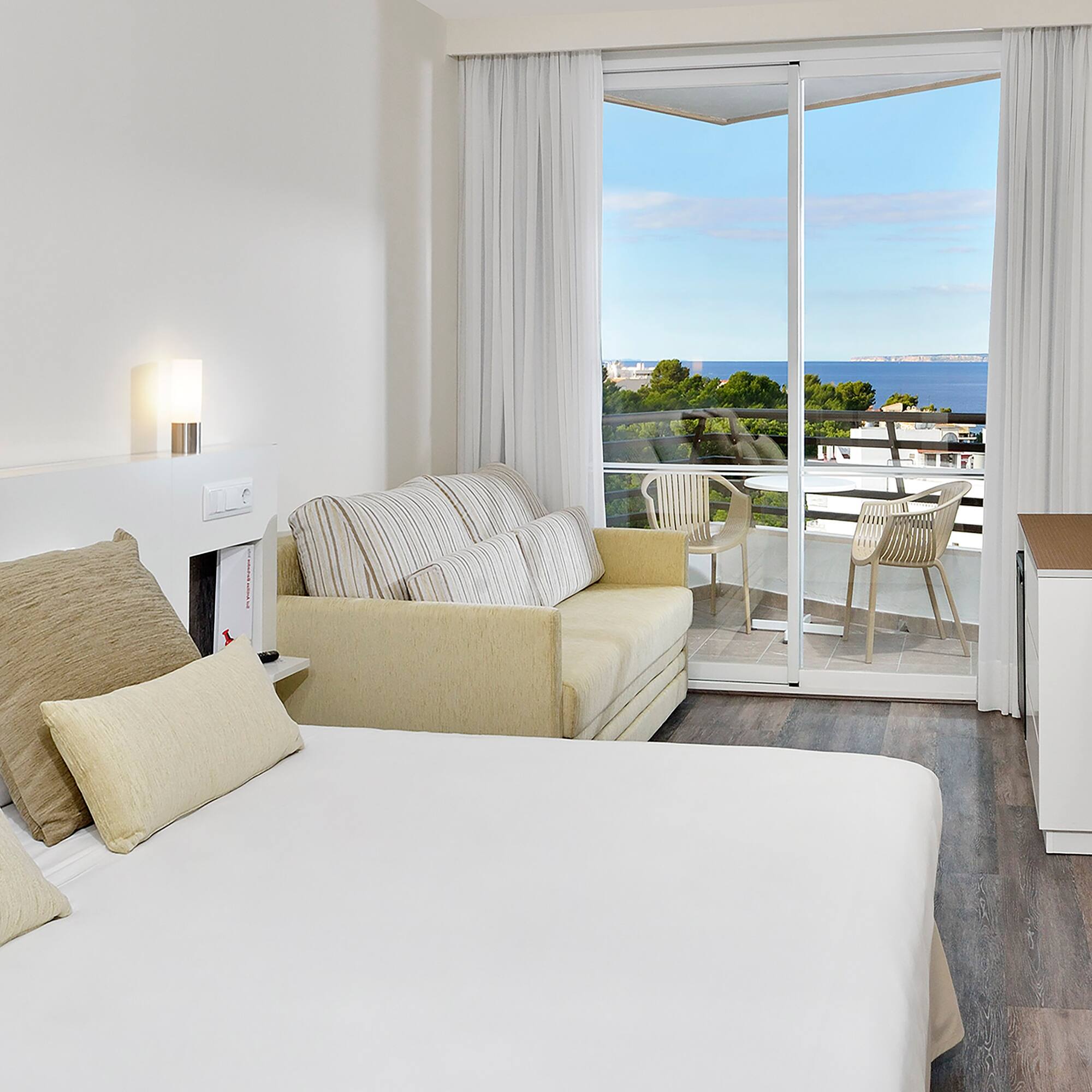 a room with a bed and a fireplace