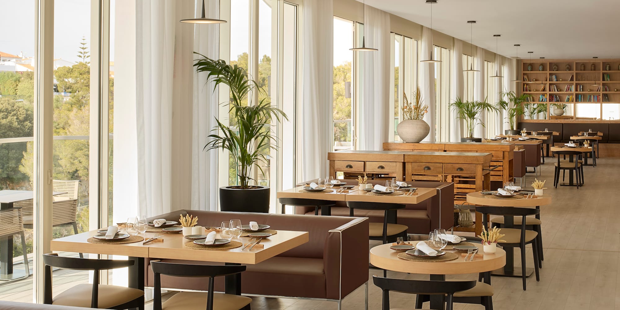 a restaurant with tables and chairs