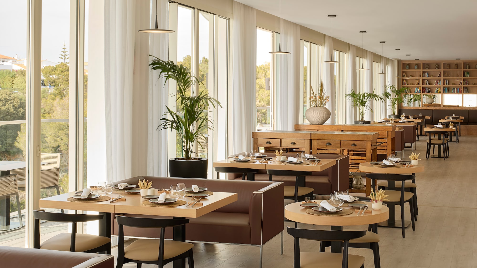 a restaurant with tables and chairs