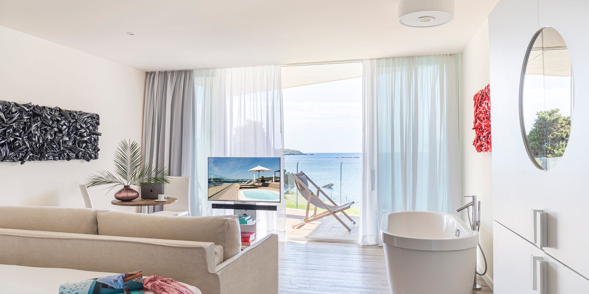 a room with a tub and a couch