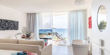 a room with a tub and a couch