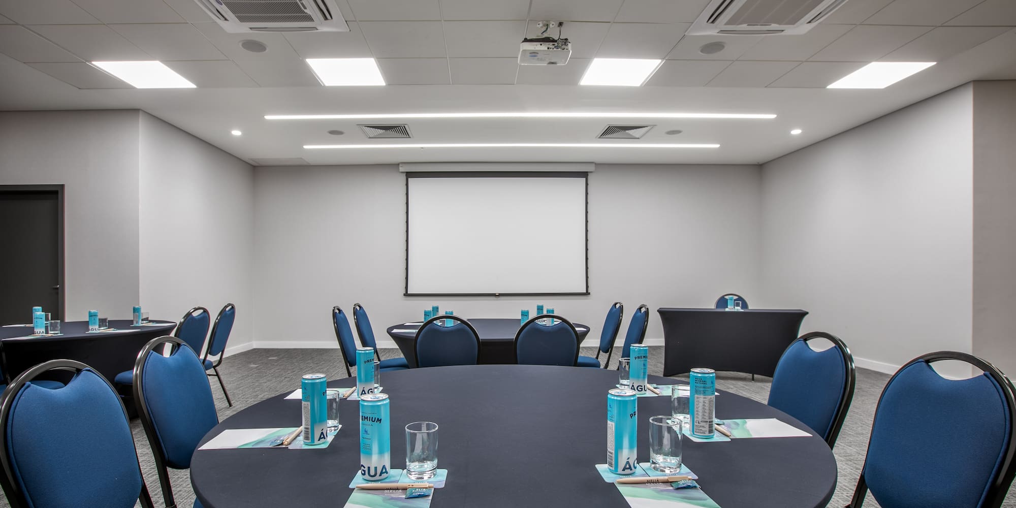 a room with a table and chairs