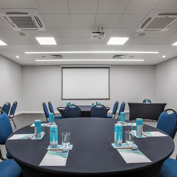 a room with a table and chairs