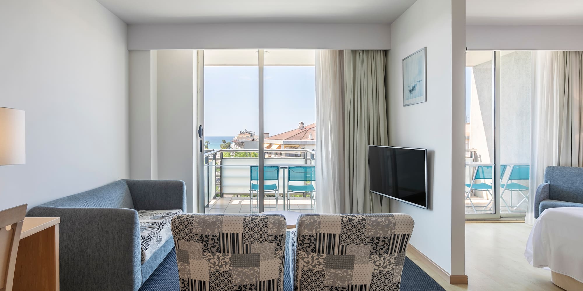 a living room with a couch and a television