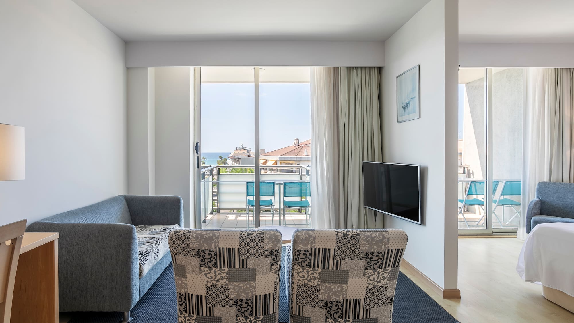 a living room with a couch and a television