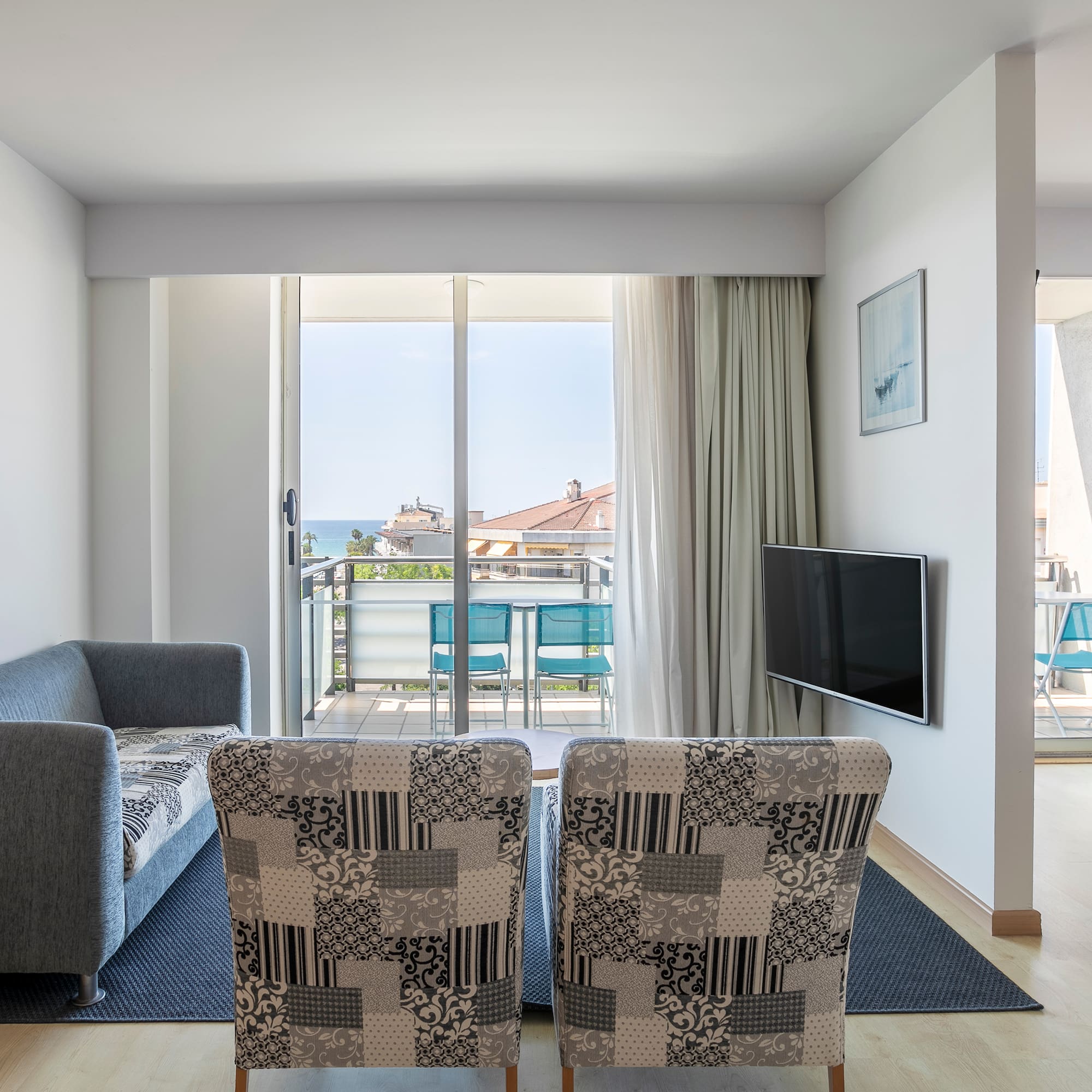 a living room with a couch and a television