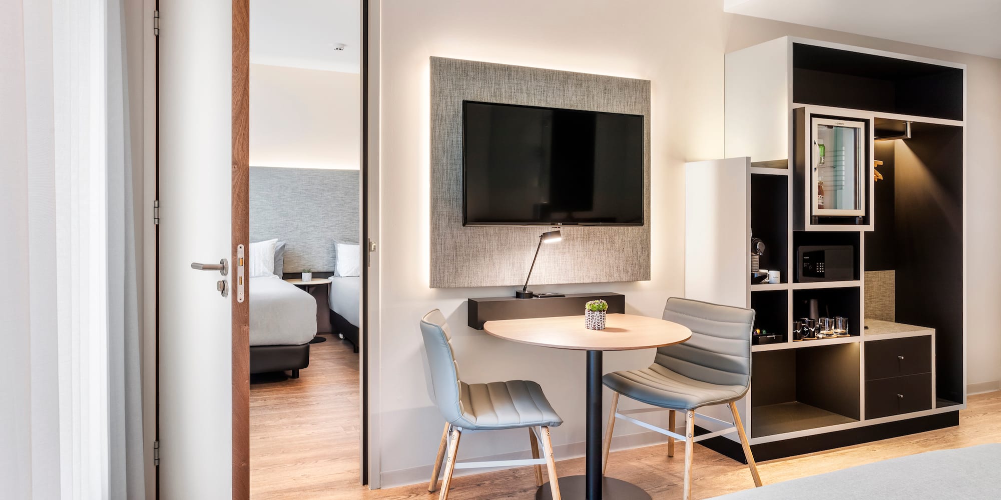 a room with a table and chairs