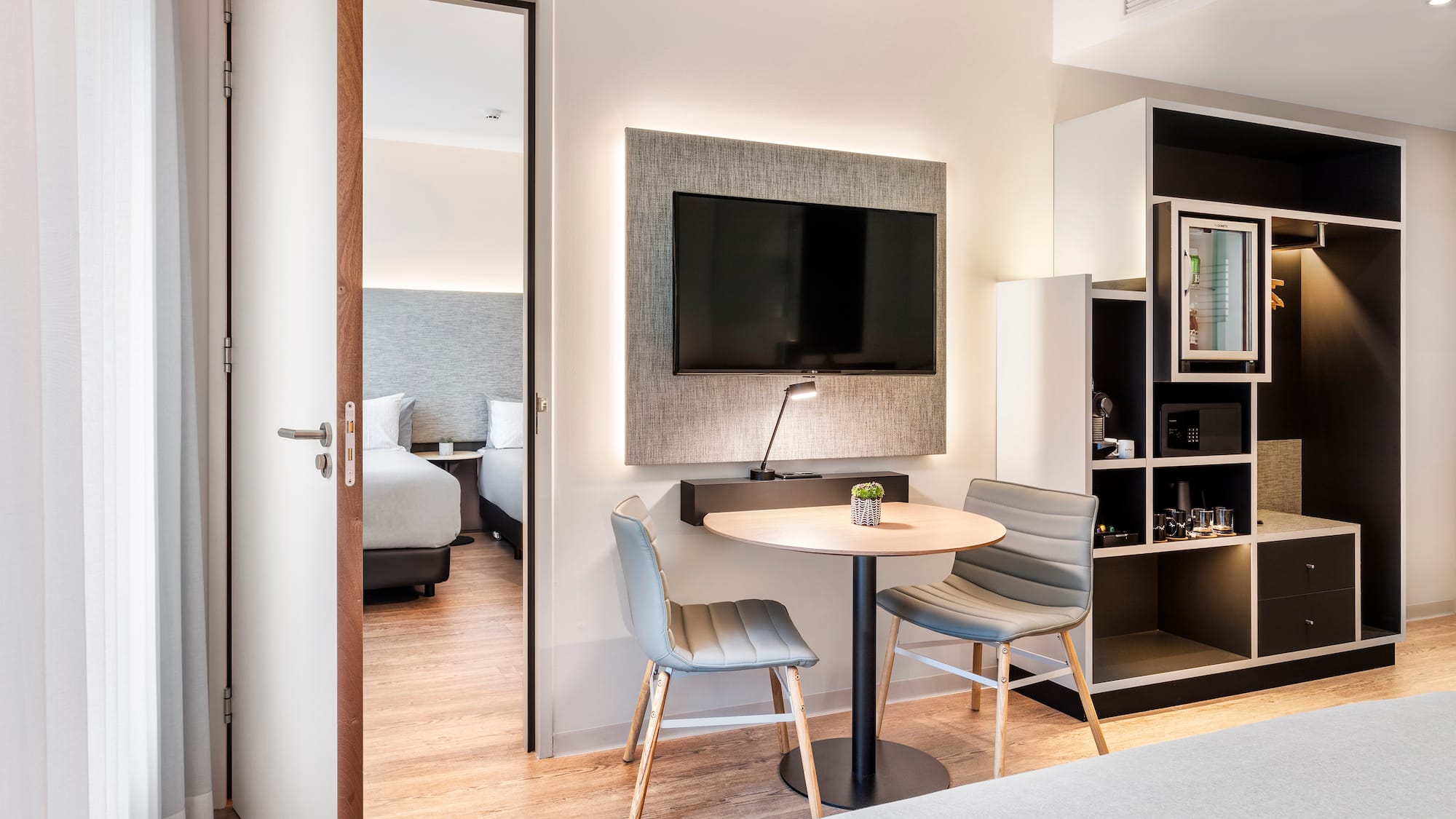 a room with a table and chairs