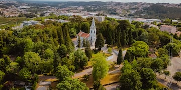 a church surrounded by trees