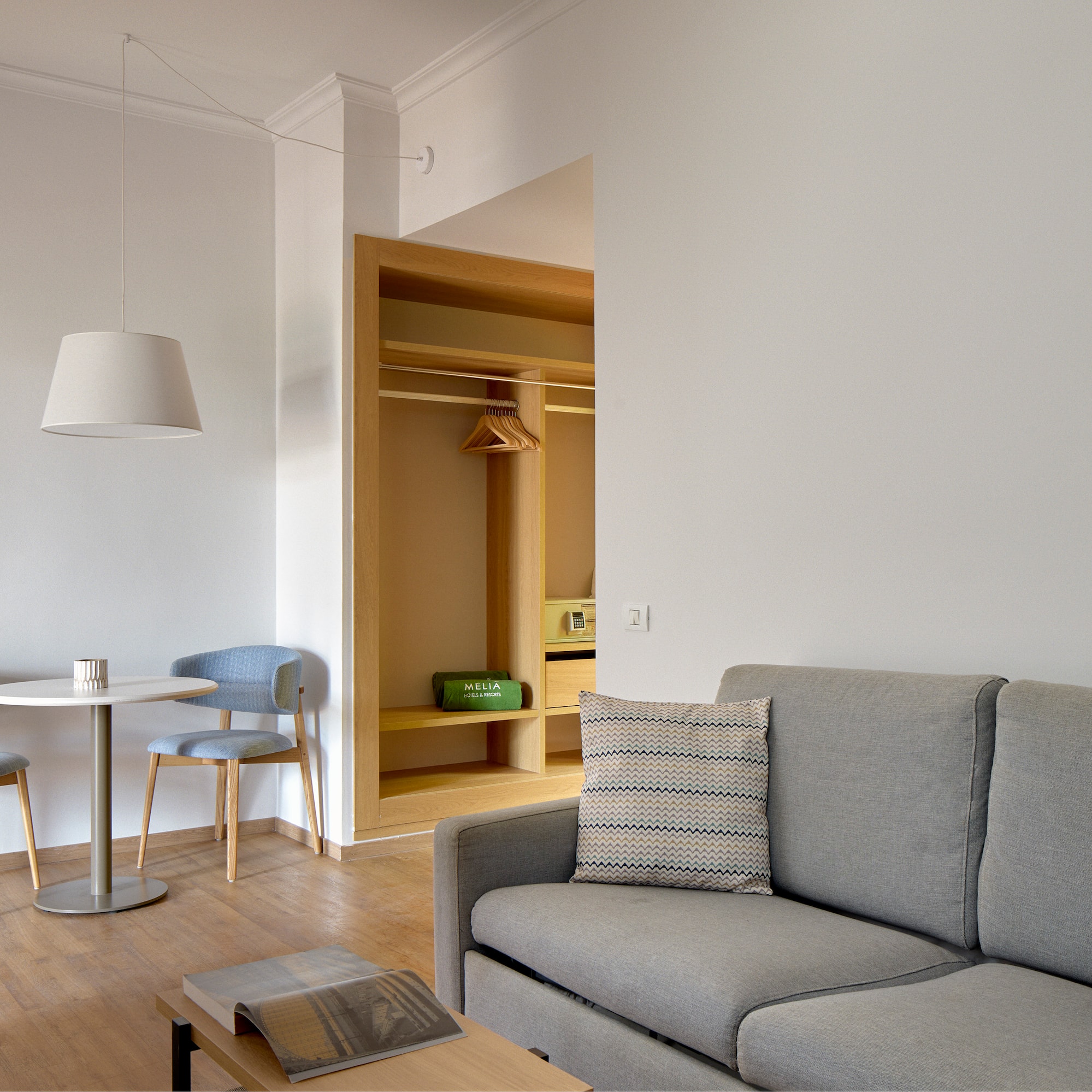 a living room with a couch and table