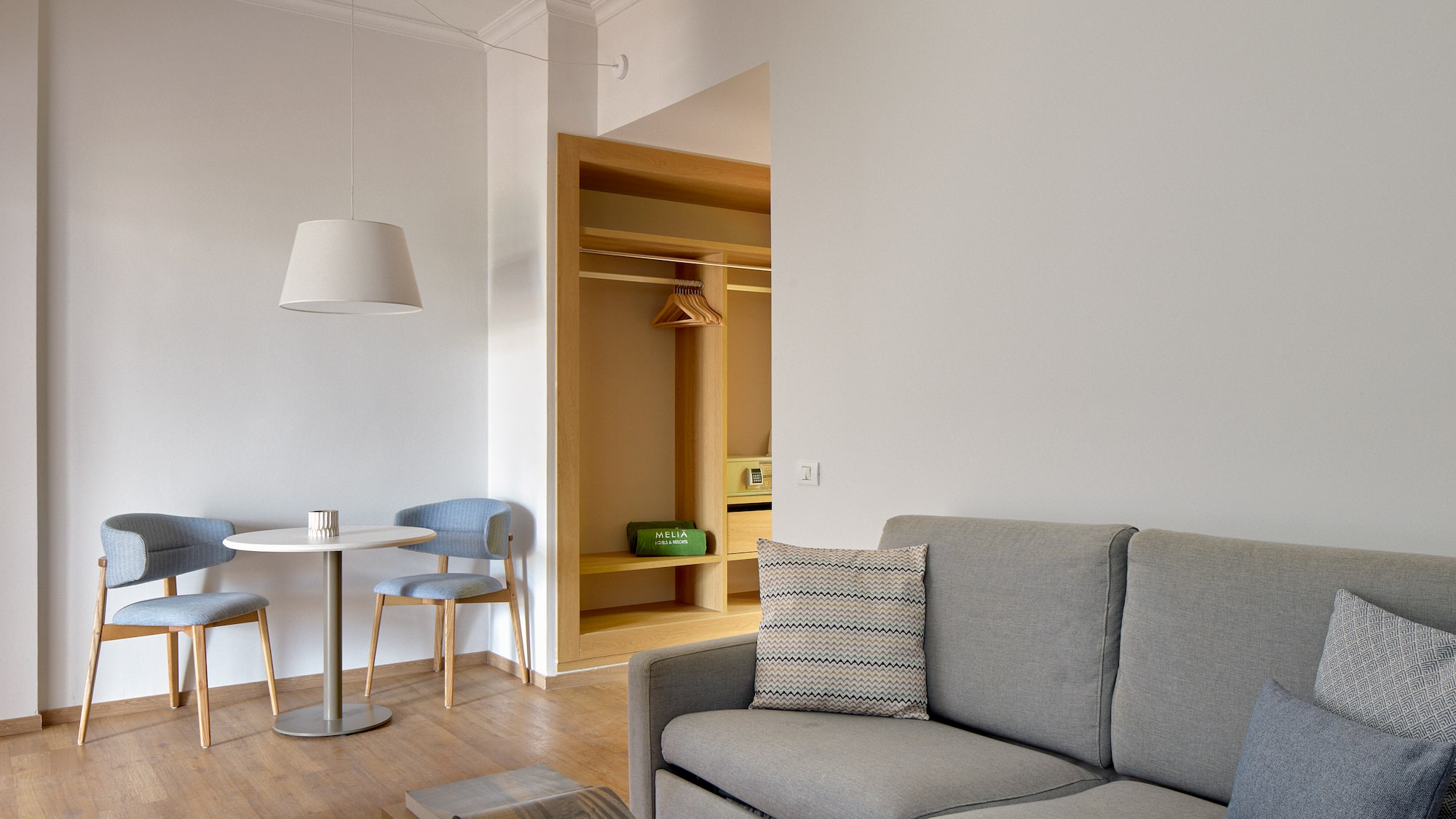 a living room with a couch and table