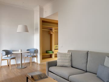 a living room with a couch and table