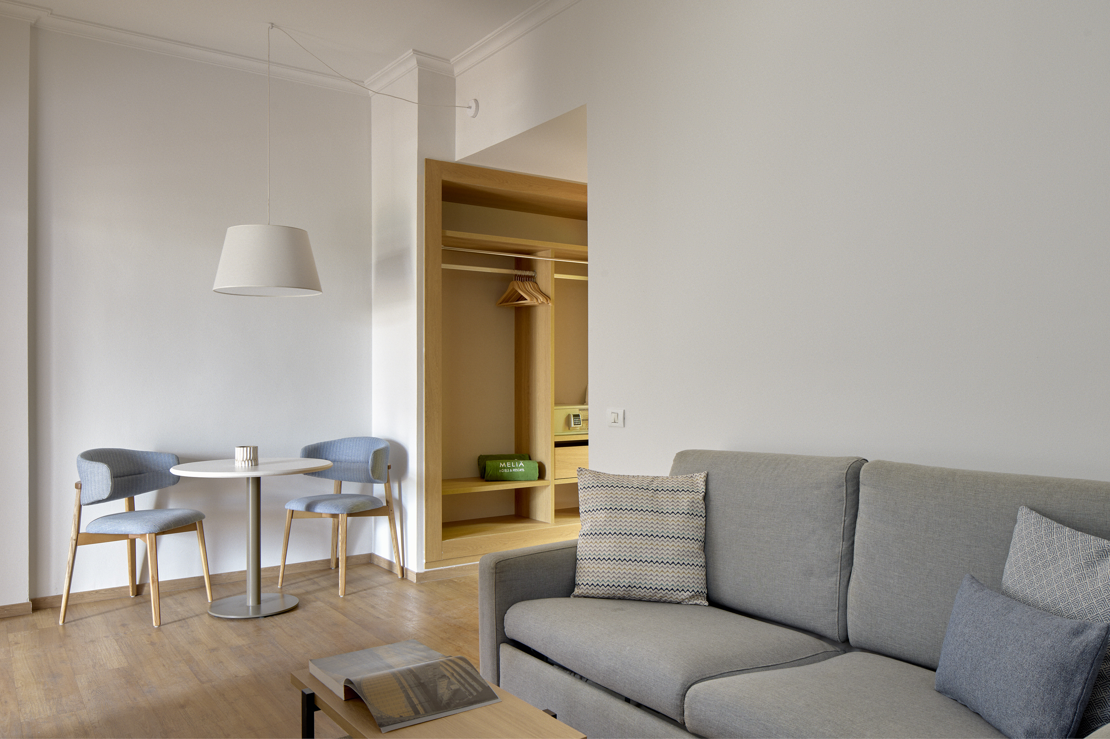 a living room with a couch and table