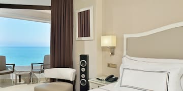 a room with a bed and a chair