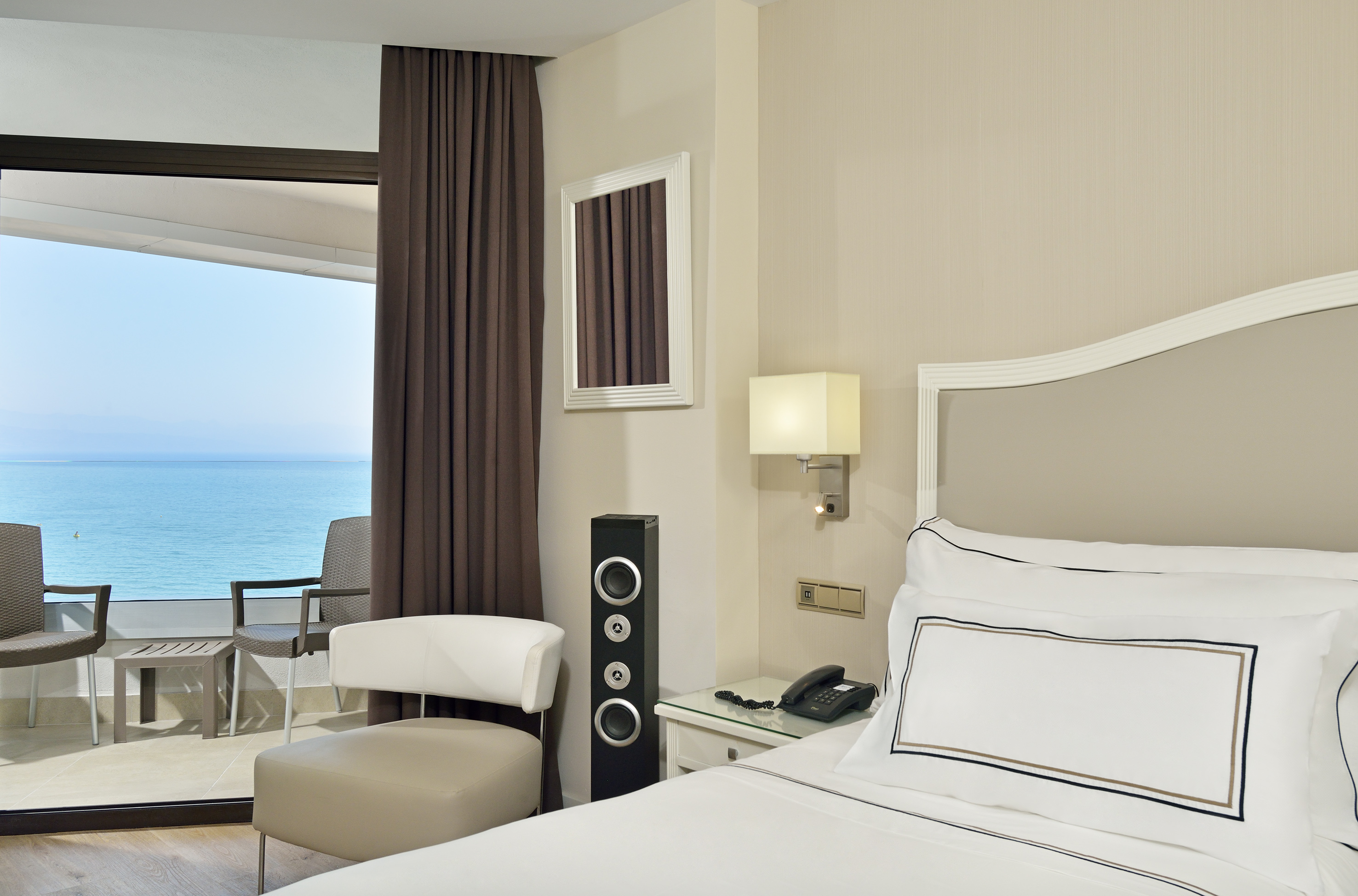 a room with a bed and a chair