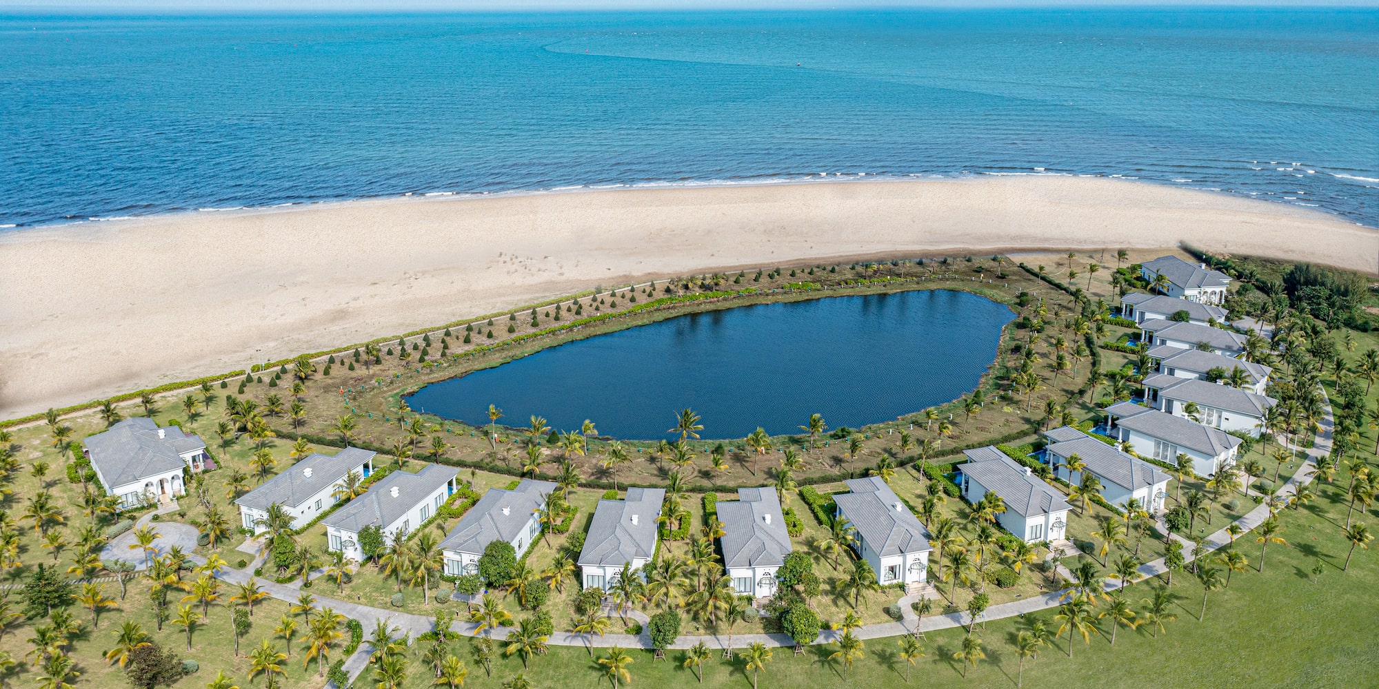 a body of water next to a beach