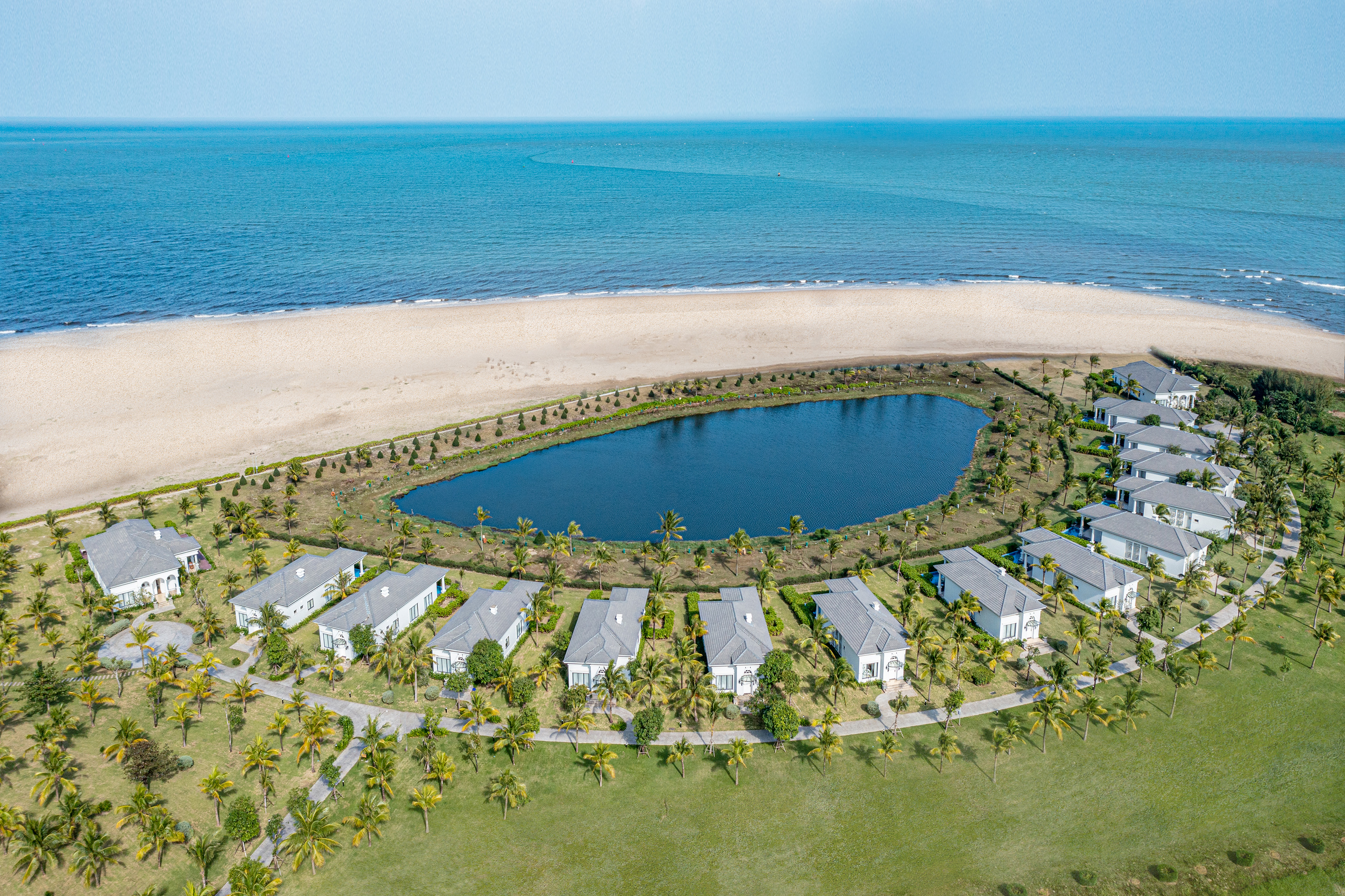 a body of water next to a beach