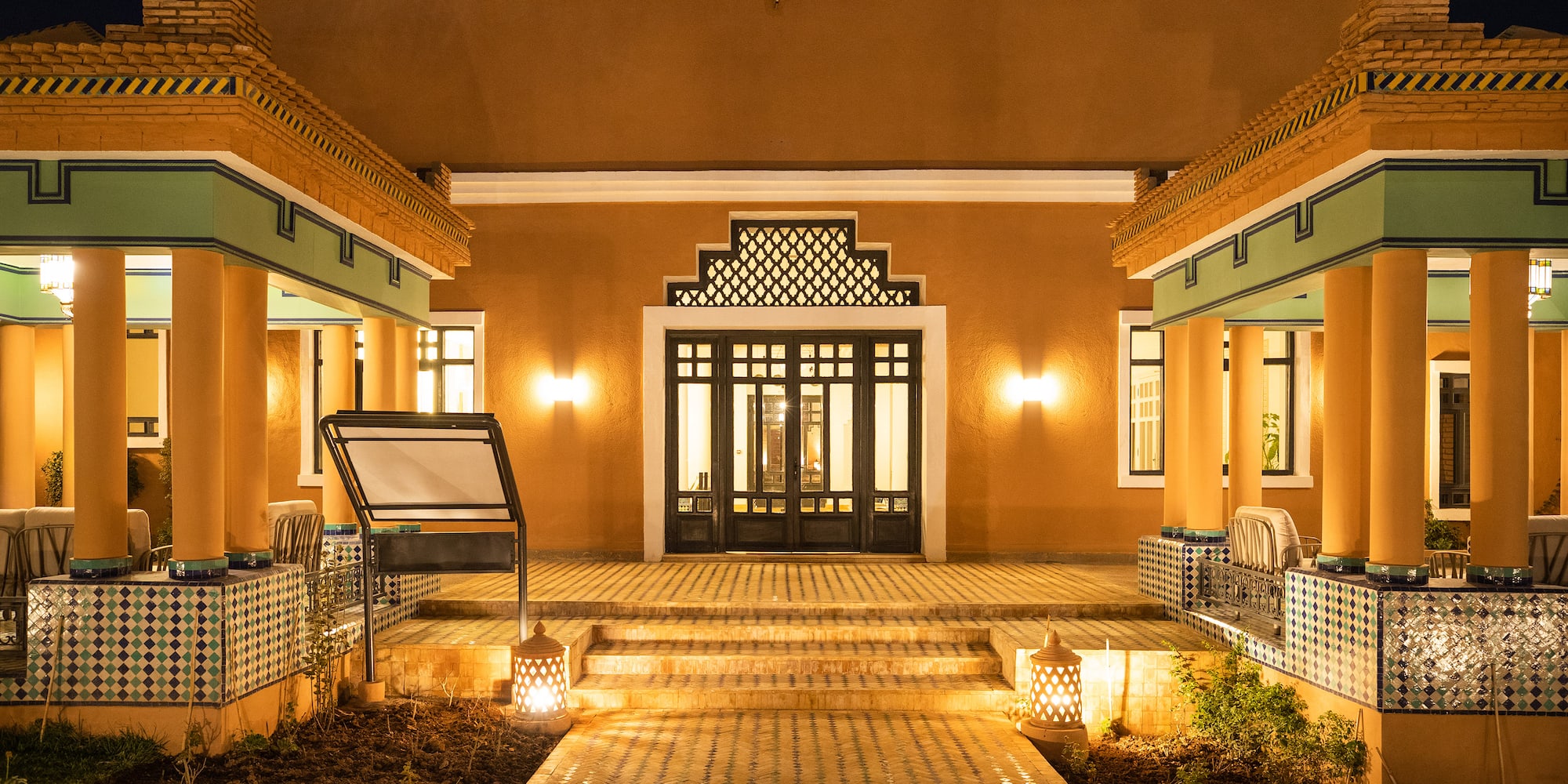 a building with a walkway and stairs