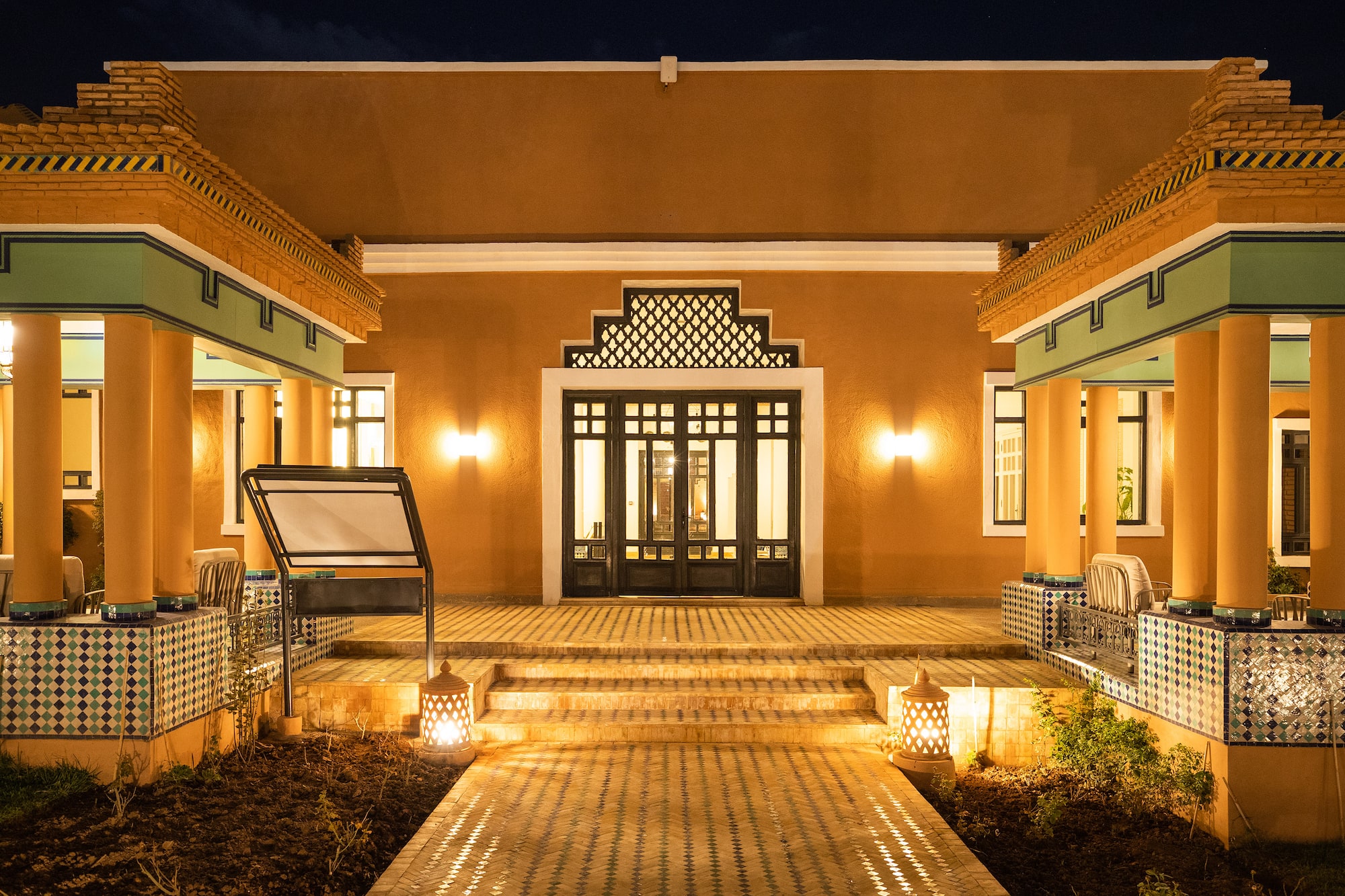 a building with a walkway and stairs