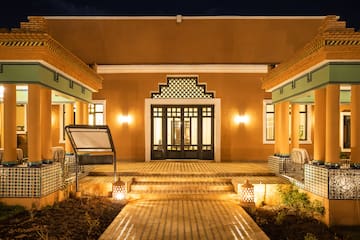 a building with a walkway and stairs