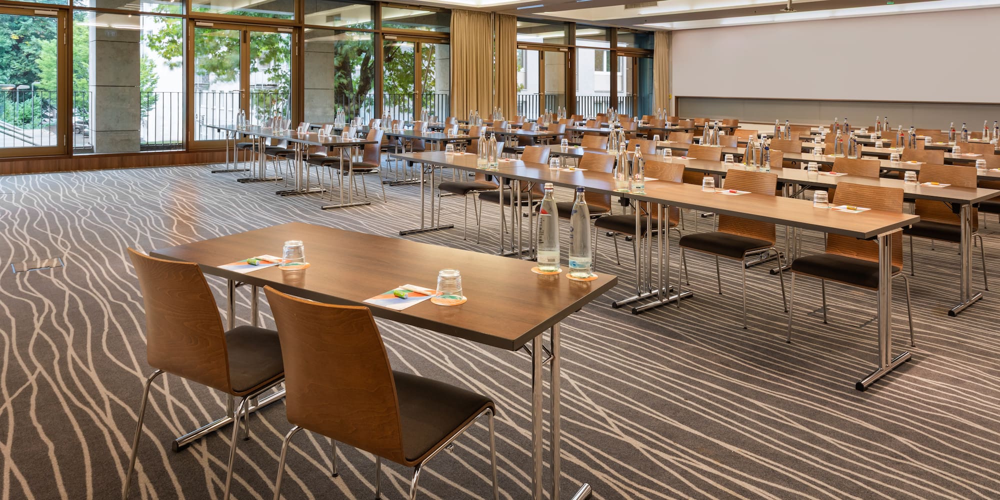 a room with tables and chairs